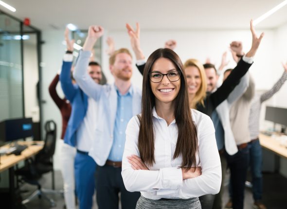 Group of successful business people happy in office